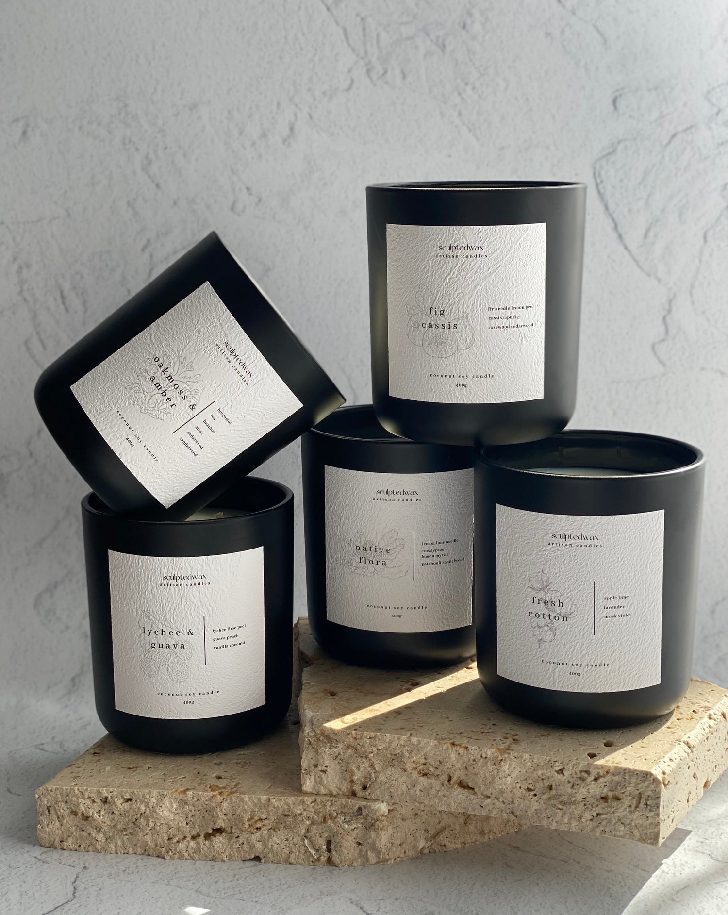 matte black scented candles by sculptedwax | lychee and guava | fig and cassis | fresh cotton | oakmoss and amber | native flora 